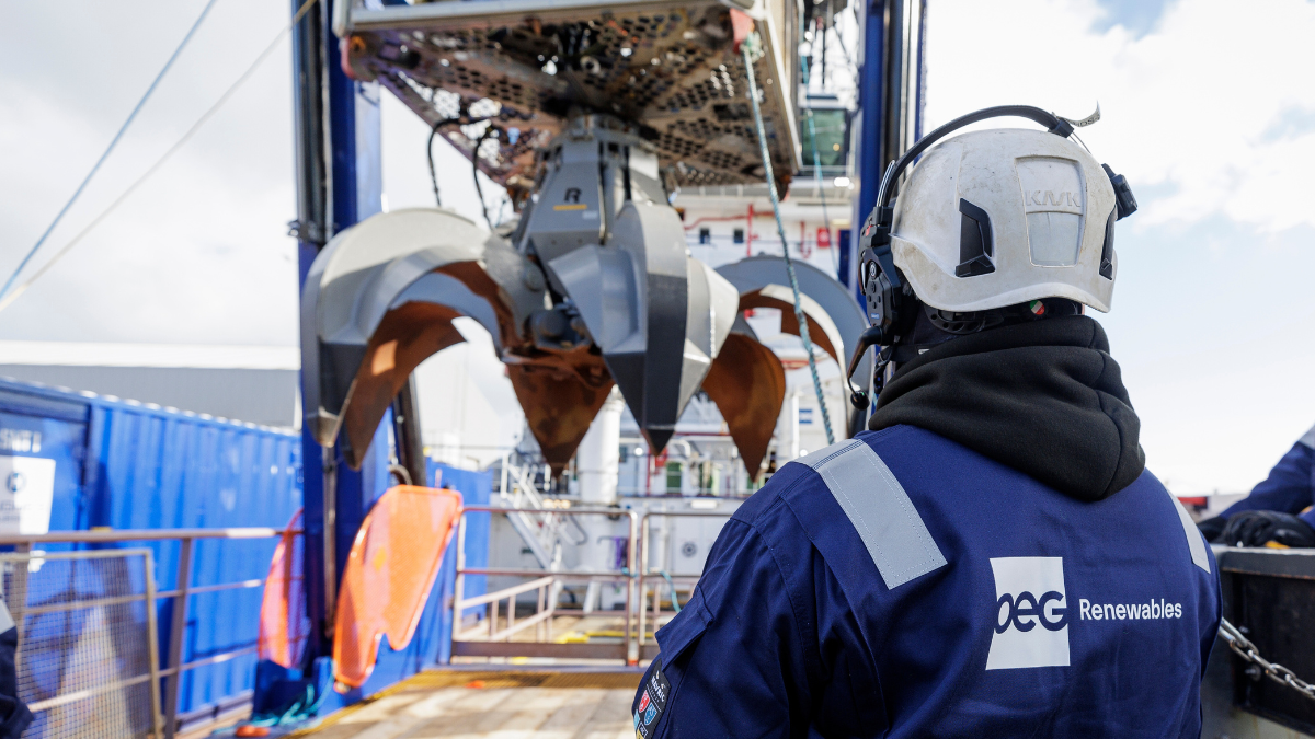 A contractor onboard a project vessel looking at a SMT-ROV, equipment used for boulder clearance